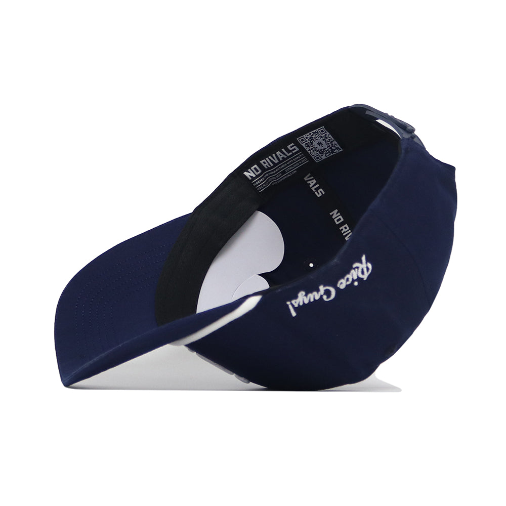 The Rice Guys Hat - Navy by No Rivals is shown upside down, displaying its black inner band with text and a QR code. The officially licensed cap features the embroidered logo "Pride Casual" in white on the side.
