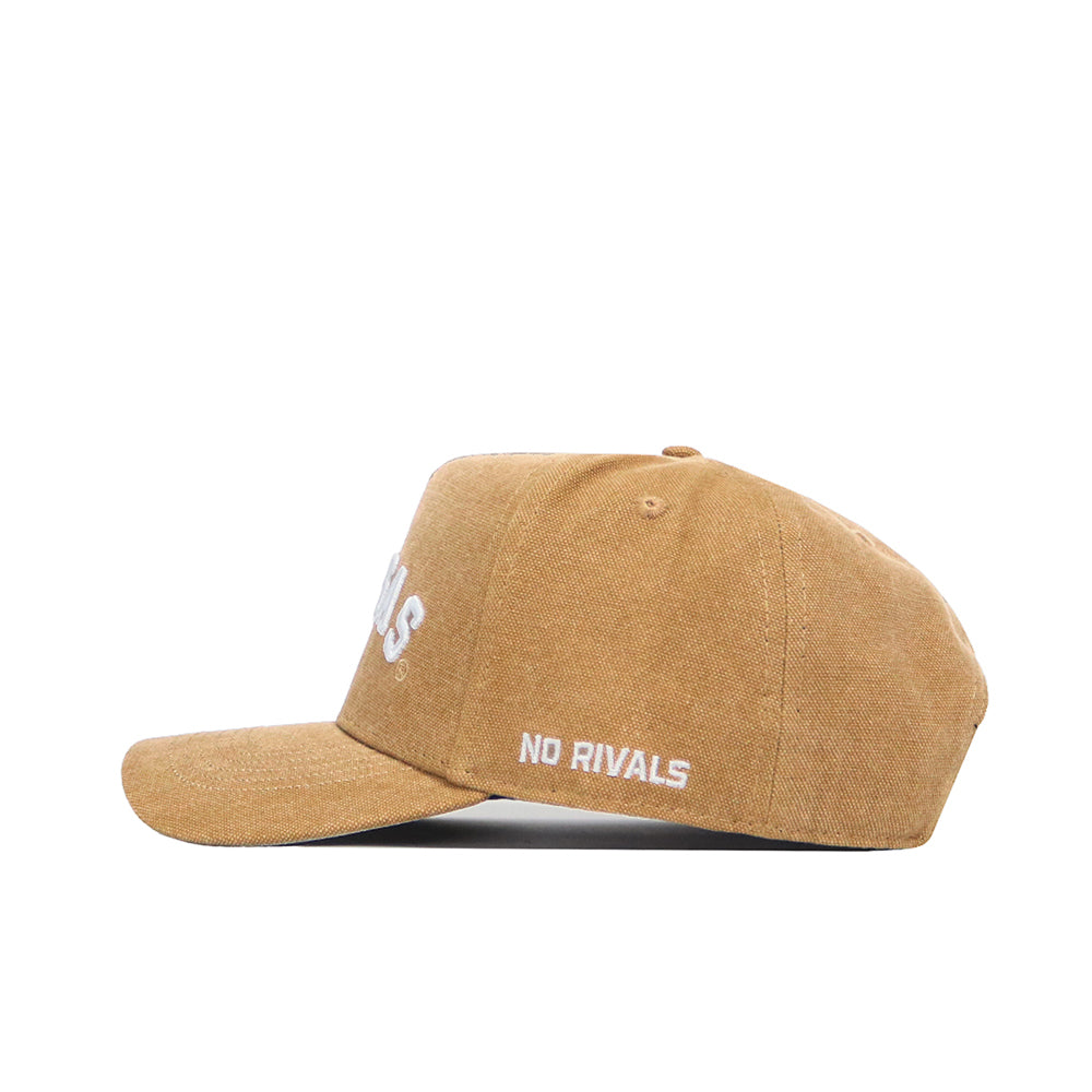 The Kansas Rustic Hat by No Rivals is a brown corduroy snapback with a flat brim and structured fit, featuring "NO RIVALS" embroidered in white on the side.