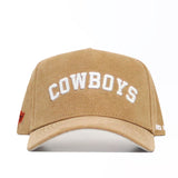 The No Rivals Oklahoma State Rustic Hat is a tan cotton canvas snapback with a structured fit, featuring "COWBOYS" embroidered in white on the front. Shown against a white background.