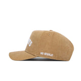 The Oklahoma State Rustic Hat by No Rivals is a tan corduroy cotton canvas cap with "NO RIVALS" embroidered in white on the side. This structured snapback is shown from a side angle against a plain white background.