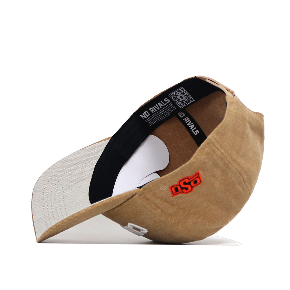 The Oklahoma State Rustic Hat by No Rivals is a tan cotton canvas cap with a curved white brim, an inner band reading "NO RIVALS," and the OSU logo embroidered in orange and black on the side.