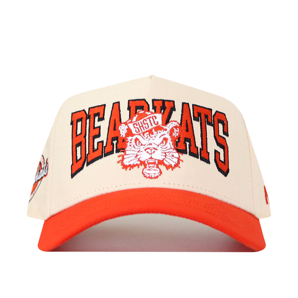 The No Rivals SHSU Bearkats Retro Block Hat is a beige and orange licensed snapback featuring BEARKATS, the wildcat face, and SHSU embroidered on the front—an ideal finishing touch for your gameday look.