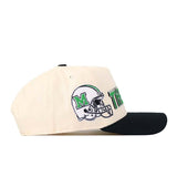 The Marshall Alma Mater Hat by No Rivals is a cream snapback cap with a black brim, showcasing an embroidered football helmet with a green M on the side. Crafted from high-quality cotton, this licensed hat features a structured fit for lasting comfort and style.