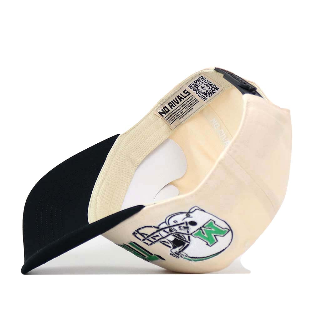 The Marshall Alma Mater Hat by No Rivals is featured here in cream and black, shown upside down to display its interior labels and a skull graphic adorned with a green K on the side. This licensed snapback cap offers a structured fit and is crafted from high-quality cotton for comfort and durability.