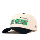 The Marshall Alma Mater Hat by No Rivals is a cream and black licensed snapback featuring MARSHALL THE HERD in bold green and black lettering on the front and an NR logo on the left side. Crafted from high-quality cotton, this structured fit cap offers lasting comfort and style.