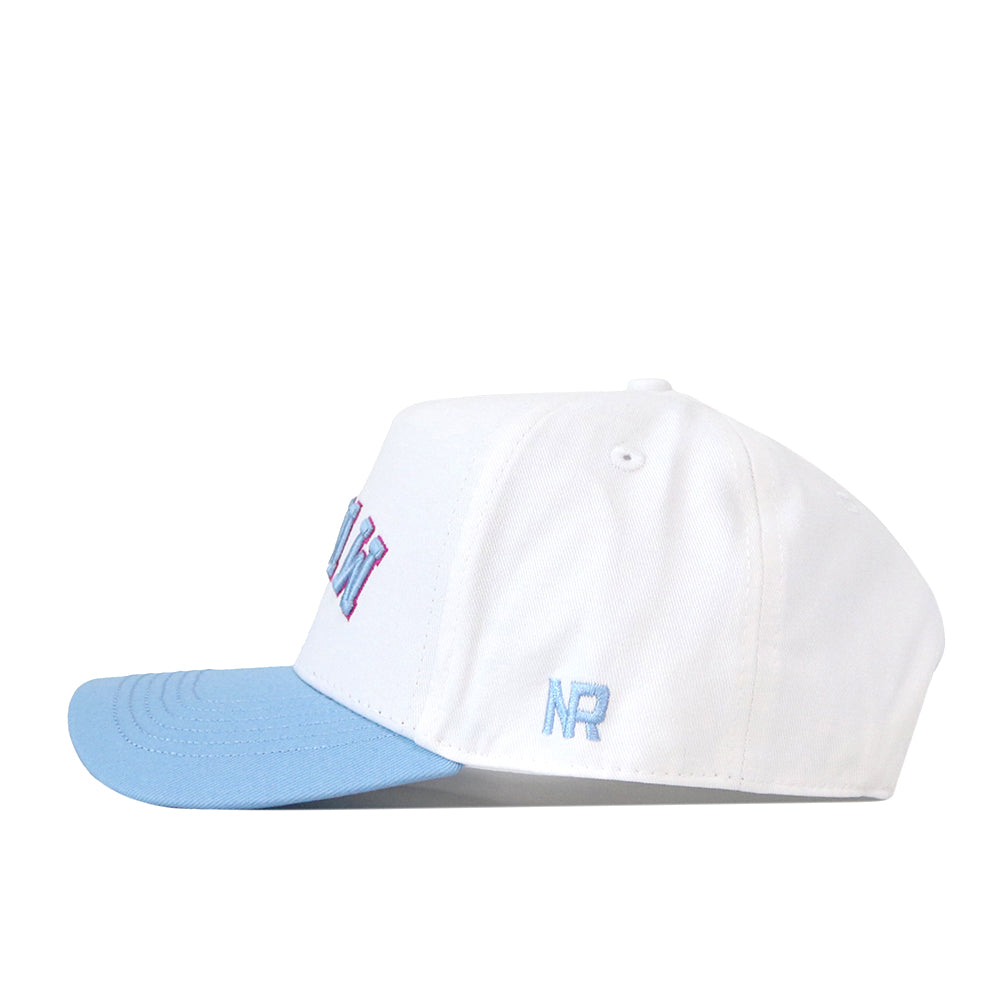 FIU Panthers | Upside Down Miami Hat - Whiteout by No Rivals, a white snapback baseball cap with a light blue brim, pink and blue embroidered “Miami” text on the front, and blue “NR” initials on the side, displayed in side profile against a white background.