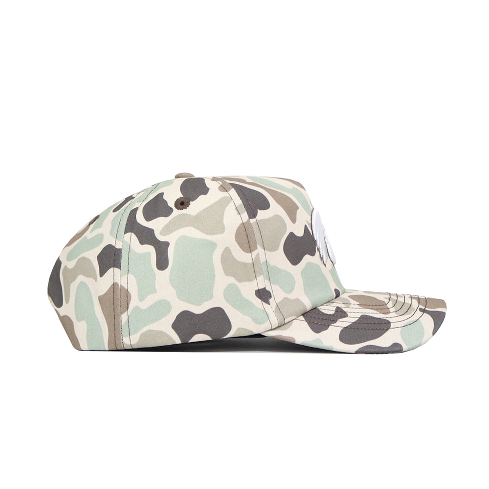 The No Rivals Iowa Huntsman Hat is displayed from the side, showcasing its green, brown, and beige duck camo pattern with a flat brim and classic snapback closure.