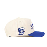 The No Rivals Right Side Up JAYS Hat - Creighton - Classic Colors is a cream cotton-canvas baseball cap with a blue brim, embroidered blue jay head and large "C", structured fit, snap back, and partial blue writing on the front.