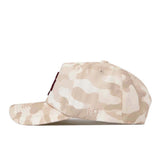 A side view of the Texas A&M Sand Camo Hat - Unstructured by No Rivals is shown, featuring a beige and white camouflage pattern, a flat brim, and an embroidered “NR” logo near the back.