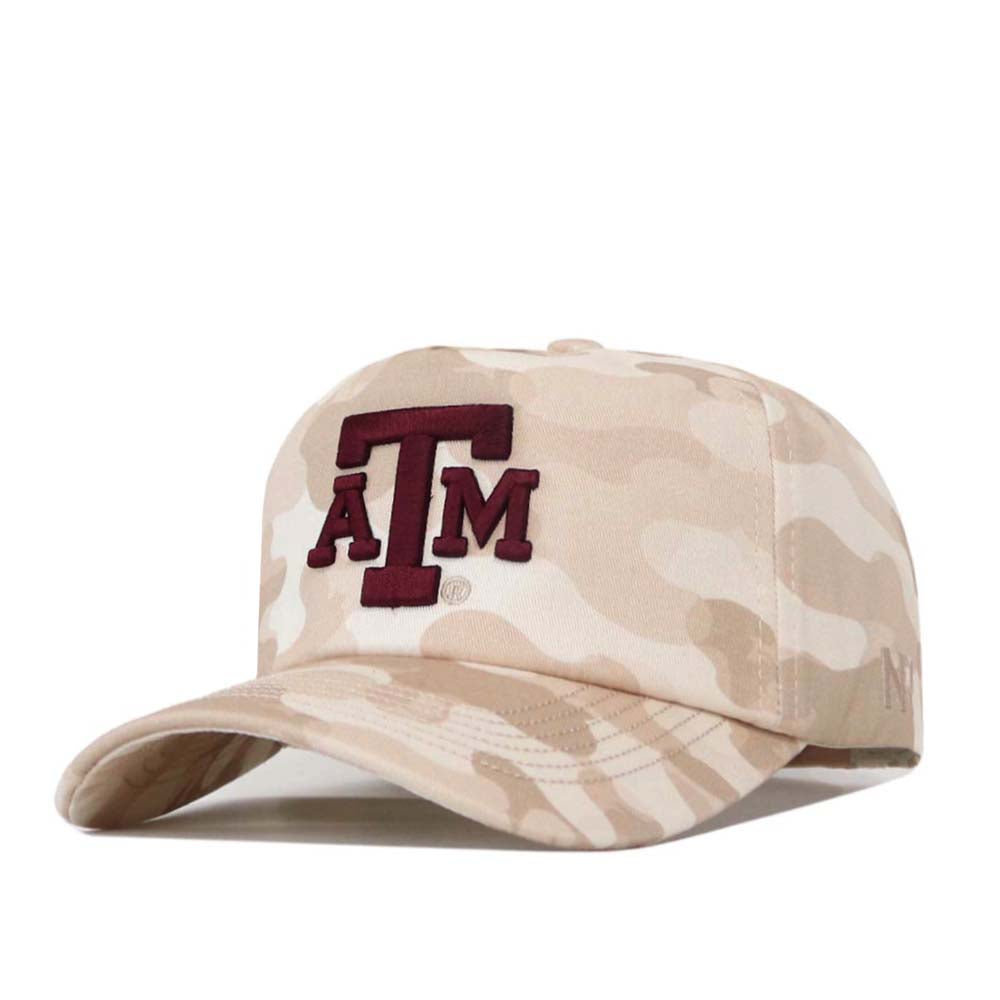 The No Rivals Texas A&M Sand Camo Hat - Unstructured showcases a beige camouflage design with a maroon, embroidered Texas A&M ATM logo on the front. This cap features a curved brim, an unstructured fit, and offers a relaxed style for all-day comfort.