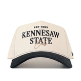 Elevate your gameday look with the Kennesaw State Owls Vintage Hat by No Rivals—a white and black snapback featuring “EST 1963 Kennesaw State Owls” embroidered in bold black and gold lettering on the front.
