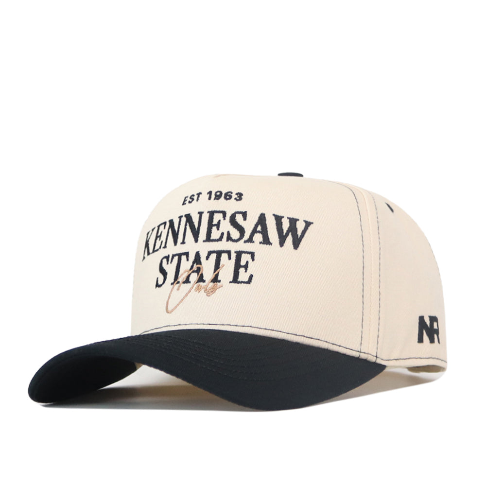 The Kennesaw State Owls Vintage Hat by No Rivals features a beige and black design, officially licensed EST 1963 Kennesaw State Owls embroidered logo on the front, NR branding on the side, and an adjustable snap back for a comfortable fit.