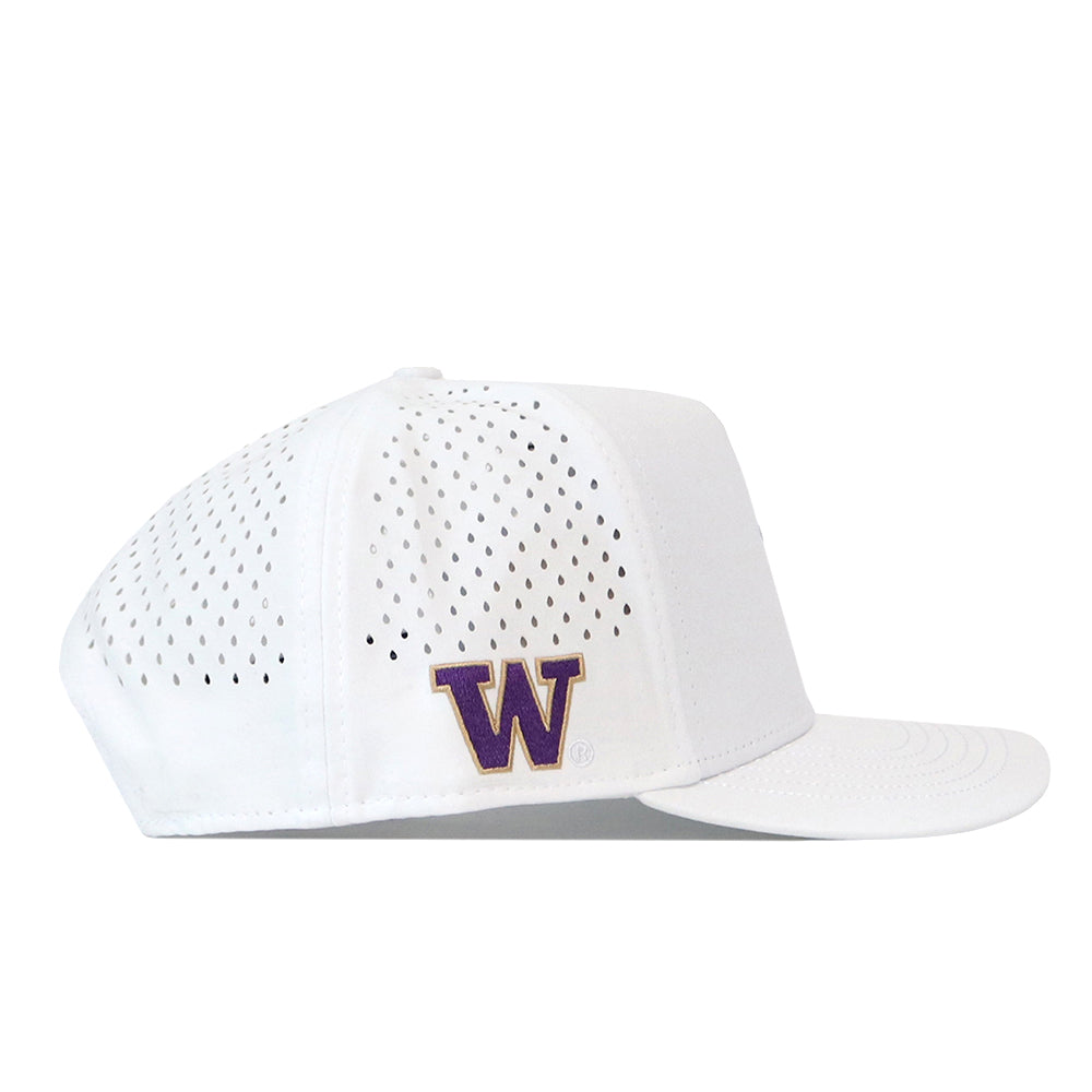 The Washington Huskies Golf Hat - White by No Rivals is shown from the side on a white background, featuring a perforated back and sides for breathability, an officially licensed purple and gold ‘W’ embroidered logo on the side panel, and an adjustable snapback closure for a comfortable fit.