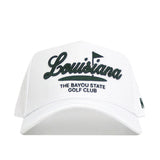 The No Rivals Louisiana Clubhouse Hat is a white snapback with a structured fit, featuring black "Louisiana" embroidery, a golf flag, and "The Bayou State Golf Club." Made of a poly-cotton blend, shown from the front on a white background.