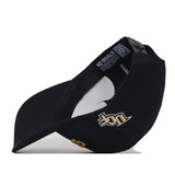 The UCF Knights | Upside Down Knights Hat - Blackout by No Rivals is a black baseball cap displayed from the side, showcasing a gold and white embroidered logo, curved brim, and “NO RIVALS” text on the inner band. This officially licensed UCF Knights hat features a classic snapback closure for a comfortable fit.