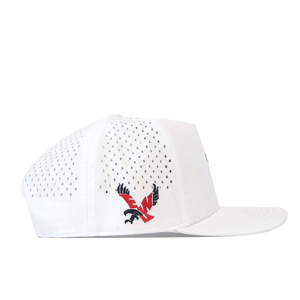 The EWU Golf Hat – White by No Rivals is displayed in profile. This performance fabric cap features large ventilation holes and a flat bill for enhanced comfort. On the side, a striking red and black embroidered eagle logo is featured, with wings spread and talons extended.