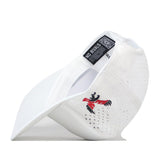 The No Rivals EWU Golf Hat in white is a perforated performance fabric baseball cap, featuring an embroidered red and black bird logo on the side and a visible “NO RIVALS” black tag under the brim.