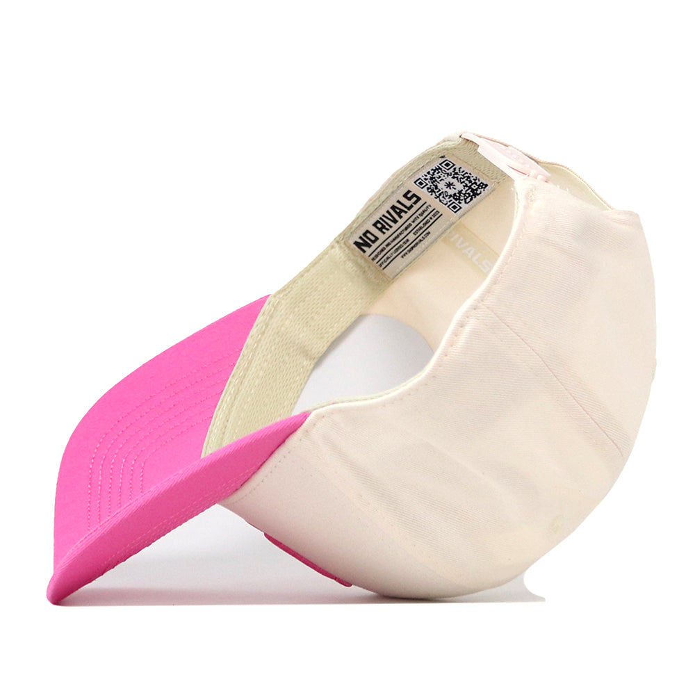 The Oregon Pink Out Hat by No Rivals is a light-colored, officially licensed baseball cap with a vibrant pink brim. Shown upside down to reveal its inner label and stitching details, this snapback hat supports the Breast Cancer Foundation, making its stylish design even more meaningful.