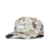 The Montana Huntsman Hat by No Rivals is a 5-panel duck camo cap with a white embroidered bear paw on the front and an adjustable snap back for a custom fit.