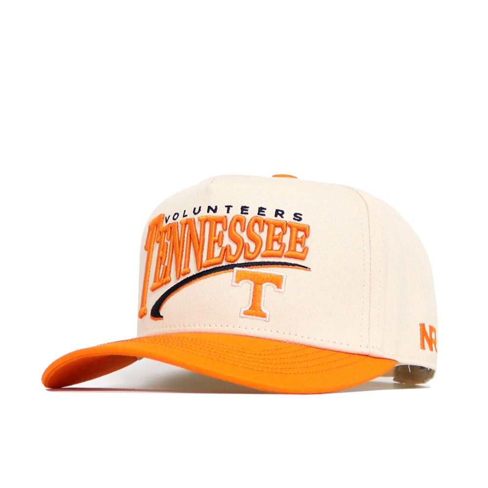 The No Rivals Tennessee Stride Hat is a beige and orange snapback with "Volunteers Tennessee" and a large embroidered logo on the front, an orange bill, detailed side embroidery, and is crafted from high quality cotton.