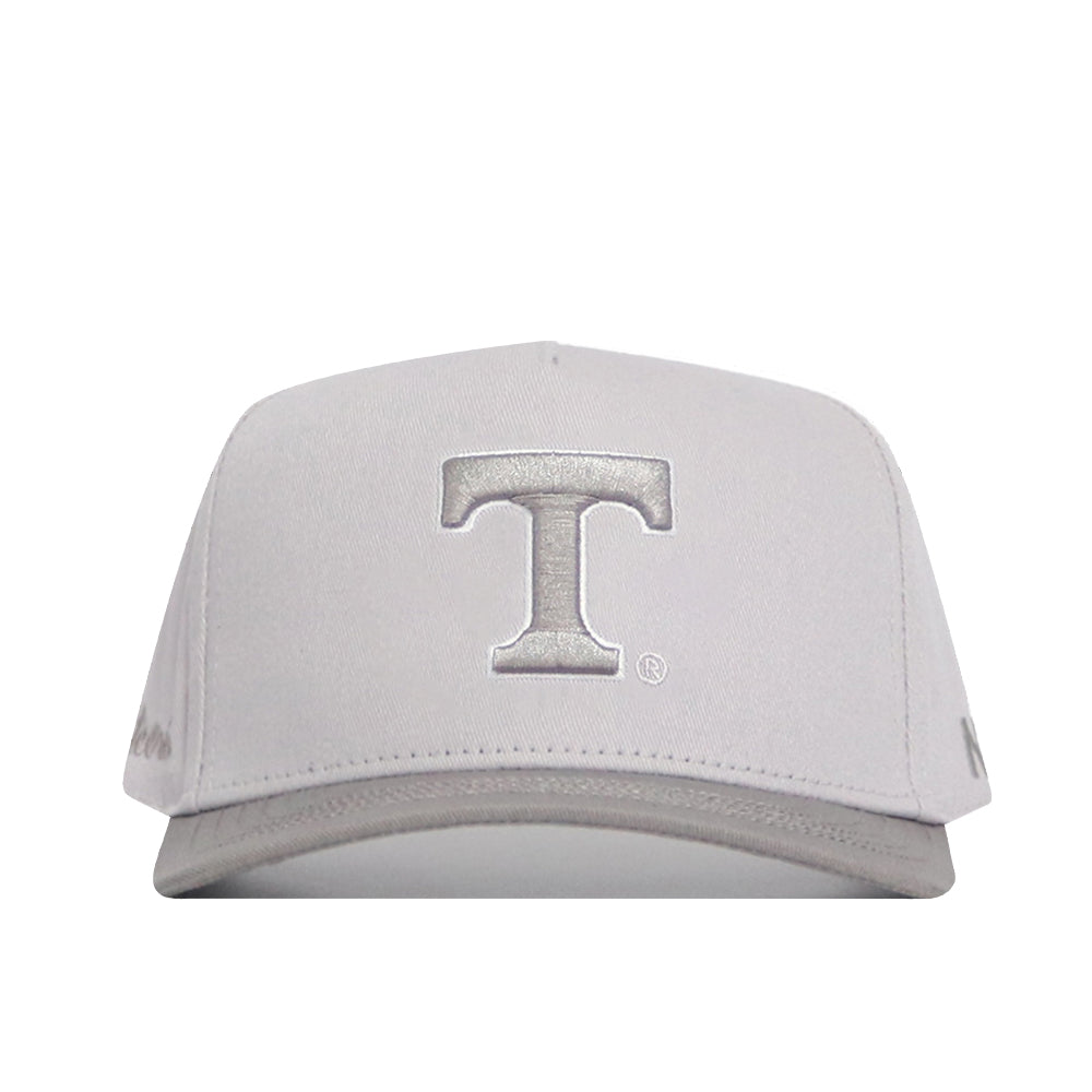 The No Rivals Tennessee Graphite Hat features a structured, light gray design with a large raised silver T embroidered on the front, a curved brim, and clean embroidered graphics for a simple, stylish look.