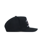The No Rivals Texas A&M Outlaw Hat in black features white embroidered text and a red graphic on the front panel. Made of high-quality cotton, it has a flat brim, structured fit, and no visible side branding.