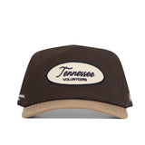 The No Rivals Tennessee Neutral Patch Hat is a brown and tan corduroy cap featuring an oval front patch with "Tennessee Volunteers" in blue and gold lettering.