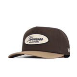 The No Rivals Tennessee Neutral Patch Hat features brown and tan corduroy, an oval "Tennessee Volunteers" patch on the front, white embroidered NF initials on the side, and a classic snapback closure.