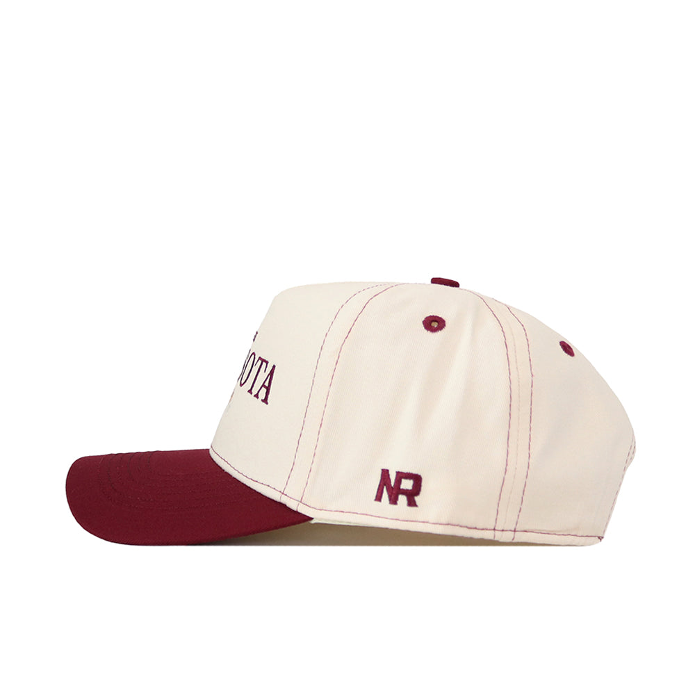 Side view of the Minnesota Gophers Vintage Hat by No Rivals—a cream and maroon snapback baseball cap featuring an embroidered NR logo on the side and maroon stitching on the panels. The maroon bill and top button add the perfect finishing touch to your gameday fit.