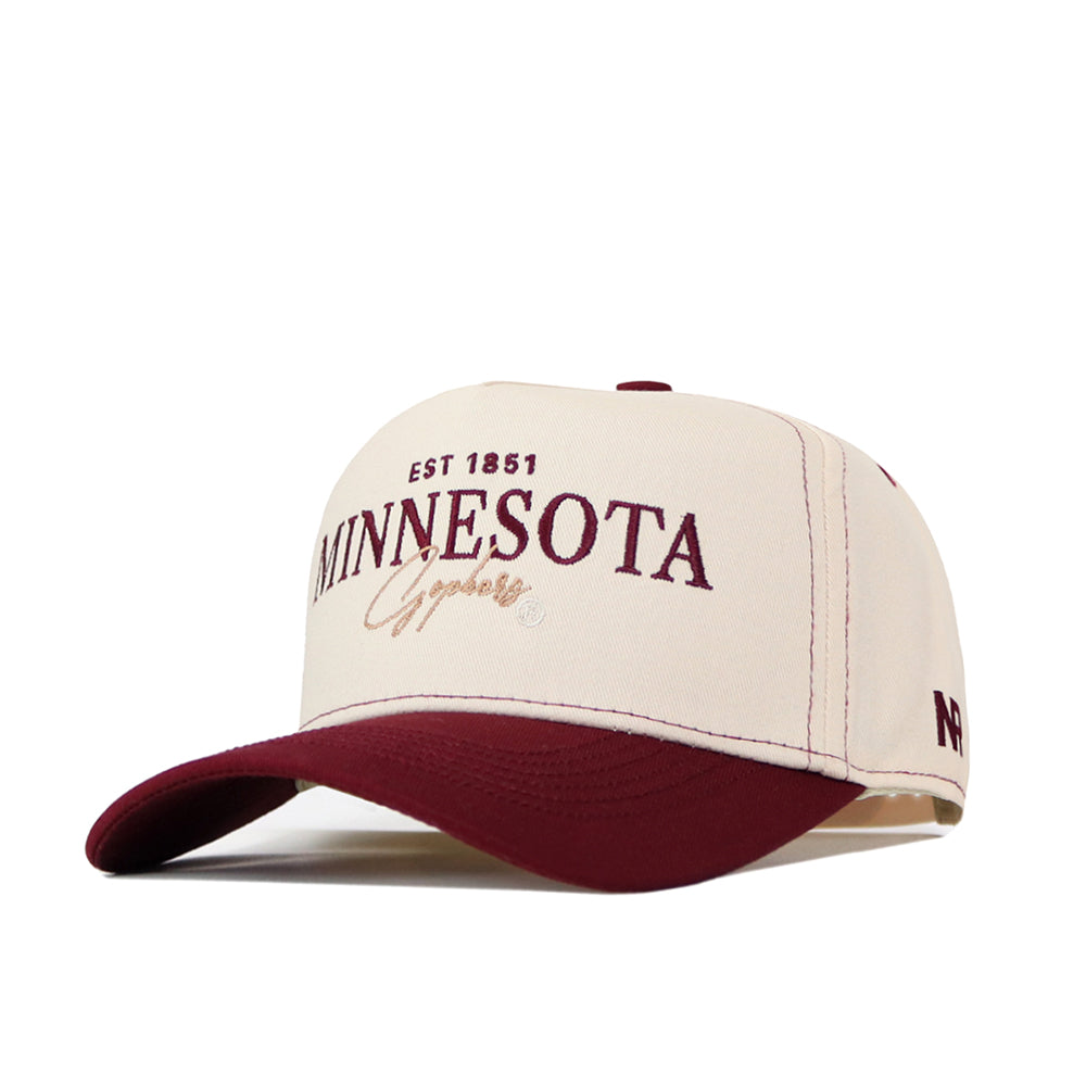 Check out the Minnesota Gophers Vintage Hat by No Rivals—a cream and maroon snapback baseball cap with “Minnesota Legends” and “EST 1851” expertly embroidered on the front. Its eye-catching logo, maroon brim, and matching button make this the perfect addition to your gameday look.