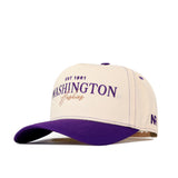 The Washington Huskies Vintage Hat by No Rivals is a cream and purple baseball cap crafted from high quality cotton, featuring “EST 1861 WASHINGTON Huskies” embroidered on the front, an NR logo on the side, and a snap back adjustment for a perfect fit.
