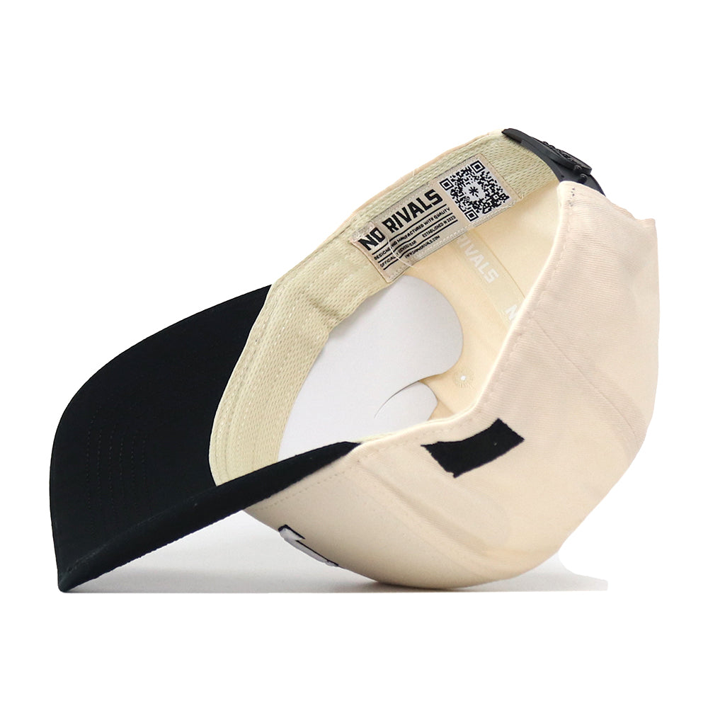 The South Dakota State Espresso Hat by No Rivals is shown inside out, revealing its interior tags, QR code, and the words NO RIVALS on the inner band—an essential addition to your gameday fit with its classic snap back design.