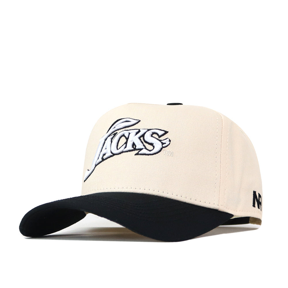 A beige South Dakota State Espresso Hat by No Rivals features a black brim and an embroidered “JACKS” logo in white and black on the front. Perfect for your gameday fit, the stylish snapback also displays the letters “NP” stitched in black on the left side.