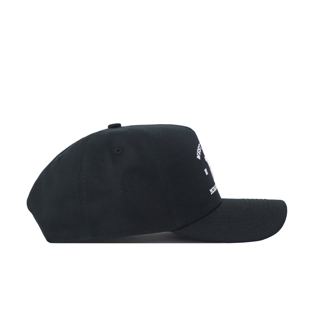 The No Rivals West Virginia Outlaw Hat in black is displayed from the side against a white background, showcasing its officially licensed design with partially visible small white text on the front right side of the cap.
