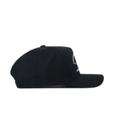 The Western Kentucky Outlaw Hat - Black by No Rivals is displayed from the side against a white background, showcasing a small embroidered logo on the front panel and an adjustable snap back for a comfortable gameday fit.