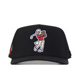 Introducing the EWU Golf Hat - Black from No Rivals: a black performance fabric hat featuring an embroidered cartoon eagle, shown from the front while swinging a golf club and dressed in a red shirt with beige pants. This hat includes a convenient snap back adjustment for a custom fit.