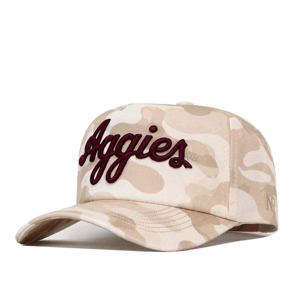 Introducing the Texas A&M Script Sand Camo Hat - Unstructured by No Rivals: This high quality cotton baseball cap features a beige and tan camouflage pattern with “Aggies” embroidered in dark red script on the front. Its unstructured, snap back design provides a comfortable and adjustable fit.