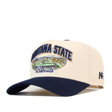 The No Rivals Montana State Bobcats Stadium Hat is a cream and navy snapback cap officially licensed with embroidered logos, including “Montana State Bobcats” and a vibrant campus image on the front. Navy accents appear on the bill and side logo.
