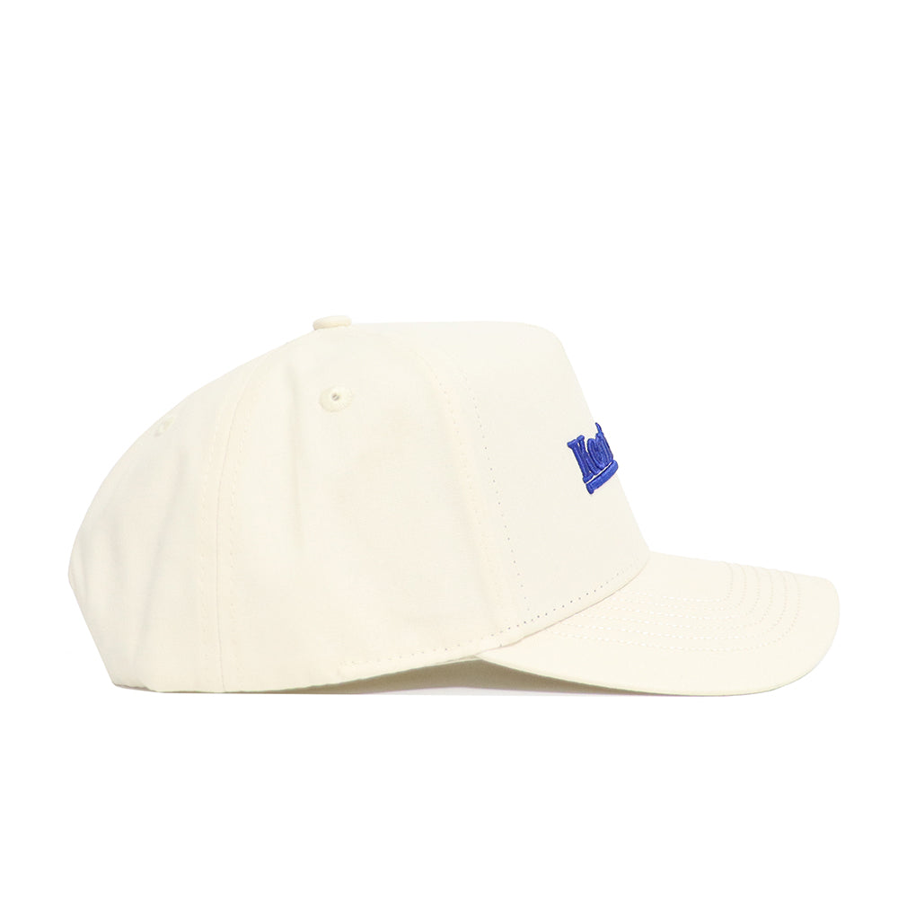 The Kentucky Sideline Hat by No Rivals features a cream color, structured fit for lasting shape, curved brim, and blue embroidered front text.