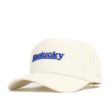 The No Rivals Kentucky Sideline Hat is cream-colored with a structured fit, features "Kentucky" embroidered in blue on the front, a curved brim, structured crown, and is officially licensed.