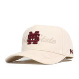 The No Rivals Mississippi State Stacked Hat is a beige, structured cotton cap with a maroon MS logo embroidered on the front, "State" in beige script behind it, and a small maroon N logo on the side.