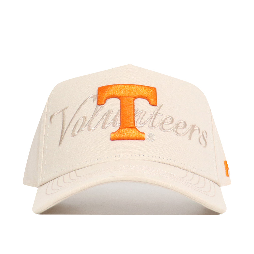 The No Rivals Tennessee Stacked Hat is a cream snapback made of high-quality cotton, with an orange T and "Volunteers" embroidered in beige script on the structured front.