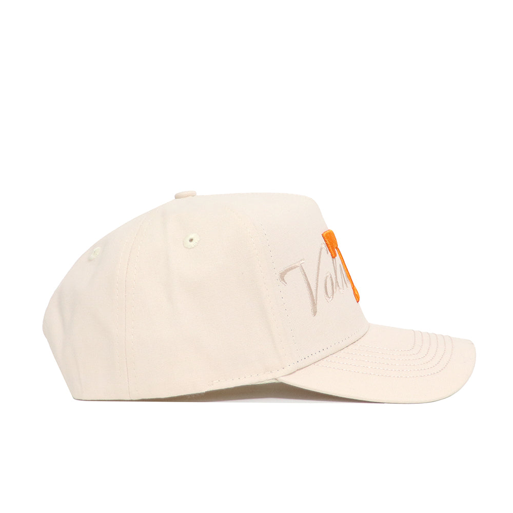 The No Rivals Tennessee Stacked Hat is a beige snapback baseball cap with beige and orange embroidered text on the front, ventilation eyelets, a curved brim, and is crafted from high quality cotton.