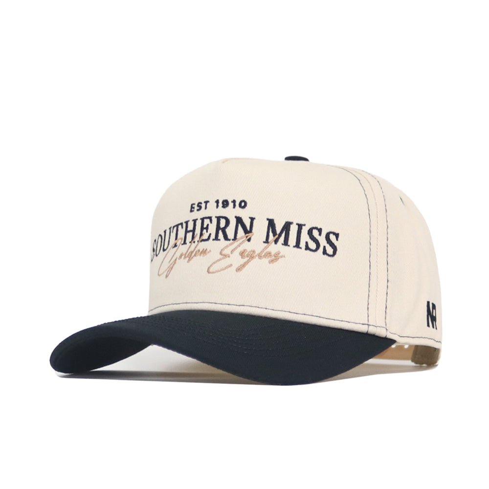 The No Rivals Southern Miss Vintage Hat is a beige and black snapback featuring “Southern Miss Golden Eagles EST 1910” embroidered in black and gold on the front, a curved black brim, and an embroidered side logo. Officially licensed.