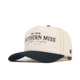 The No Rivals Southern Miss Vintage Hat is a beige and black snapback featuring “Southern Miss Golden Eagles EST 1910” embroidered in black and gold on the front, a curved black brim, and an embroidered side logo. Officially licensed.