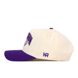 Introducing the Washington Stadium Hat by No Rivals—a white snapback cap with a bold purple brim and the signature NR initials delicately embroidered on the side. The front showcases striking purple embroidered logos and an emblem, adding eye-catching detail from every angle. This officially licensed hat combines team spirit with modern comfort for a standout look.