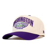 The No Rivals Washington Stadium Hat is a cream and purple snapback featuring the Washington Huskies and a stadium embroidered on the front, with officially licensed embroidered logos for an authentic look.