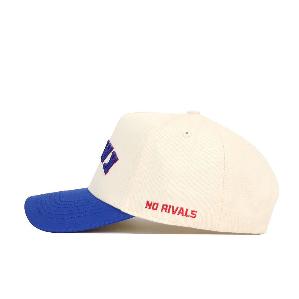 The Upside Down KANSAS Hat by No Rivals features classic Kansas Jayhawks colors with a white snapback, blue brim, and "NO RIVALS" red embroidery on the side, crafted from premium cotton.