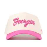 Show your support for the National Breast Cancer Foundation with the No Rivals Georgia Pink Out Hat—a stylish snapback featuring “Georgia” embroidered in pink cursive on the front, a bright pink brim, and classic white panels.