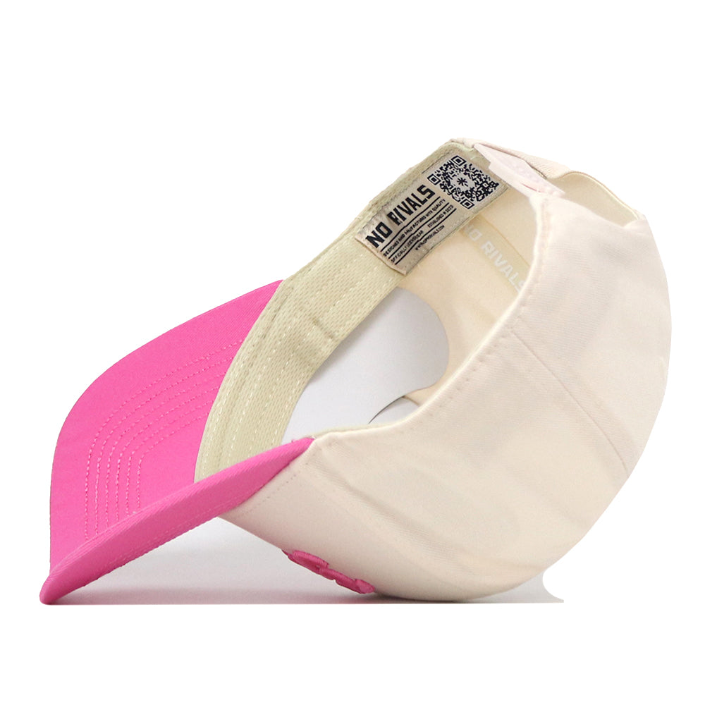 A cream-colored Georgia Pink Out Hat by No Rivals is displayed upside down, revealing an interior label with the brand name and a QR code. This stylish snapback is the perfect way to make a statement and show your support.